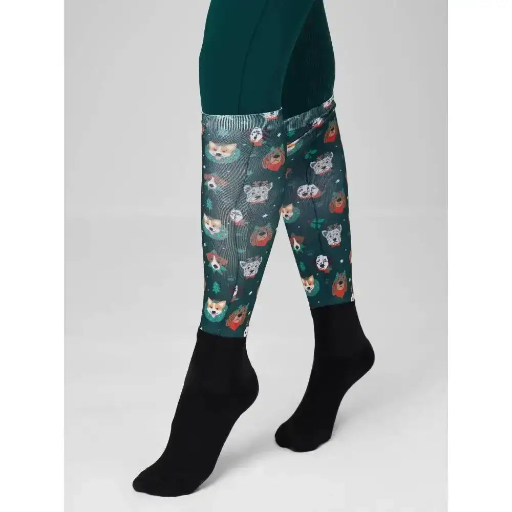 Dark green lemieux footsie socks with festive cartoon dog faces and black heel and toe perfect for footsie socks christmas fun