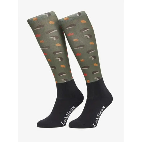 Lemieux footsie socks hedgehogs knee-high olive green and black socks with playful orange sushi roll pattern