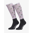 Lavender lemieux footsie socks lucky magpie with black white magpie pattern teal accents and black cuffs with brand name
