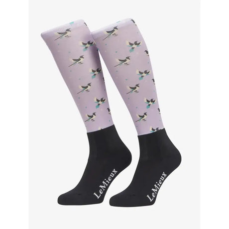 Lavender lemieux footsie socks lucky magpie with black white magpie pattern teal accents and black cuffs with brand name