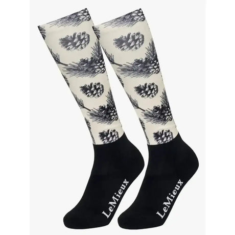 Cream lemieux footsie socks pine cones with black pinecone and branch design and solid toe and heel sections