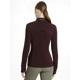 A maroon lemieux fleece damson frances quarter zip with high collar and subtle black back paneling visible