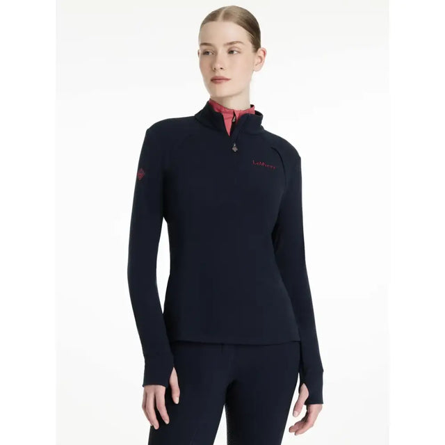 Navy blue lemieux frances quarter zip fleece navy with red inner collar and subtle brand embroidery for active wear