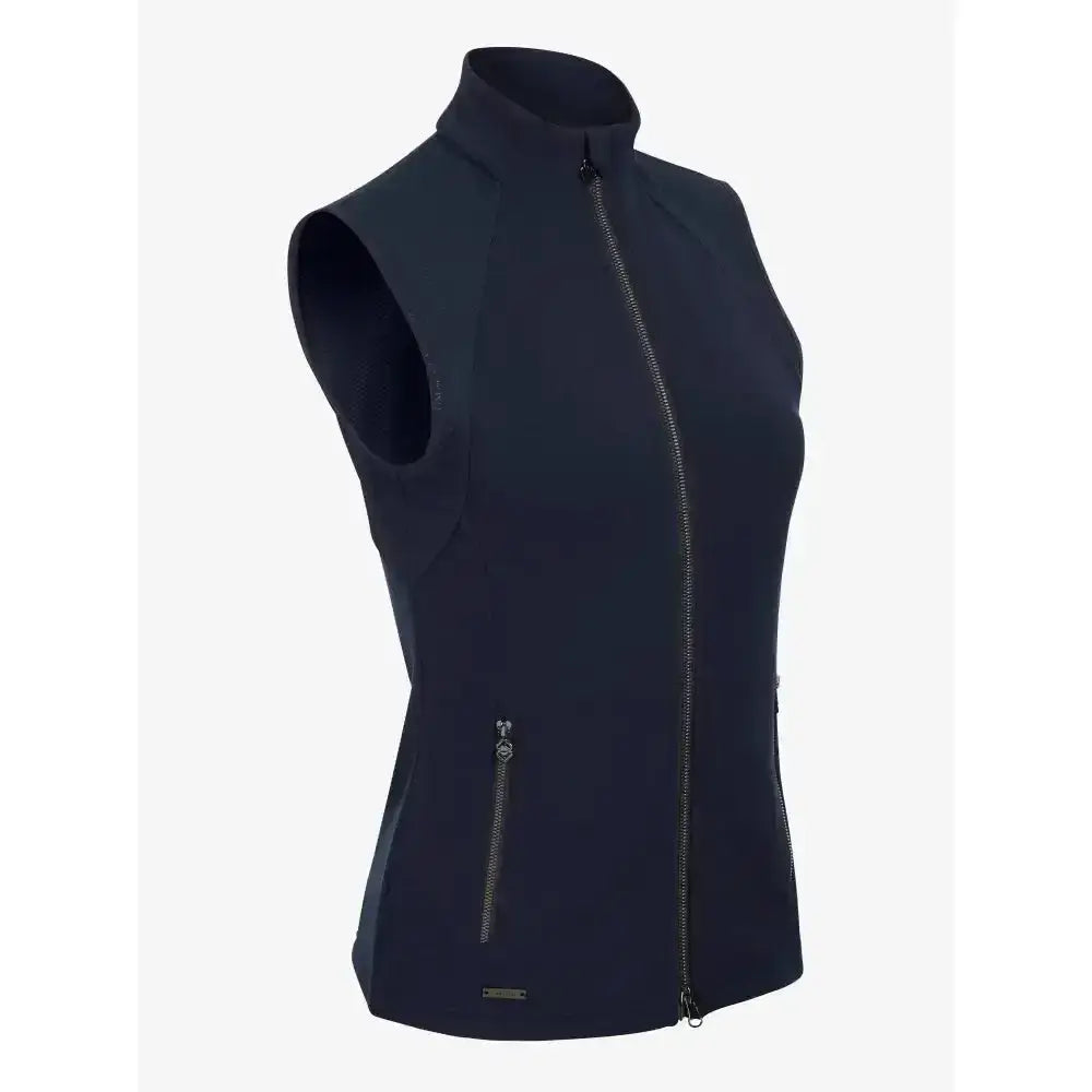 Black sleeveless zip-up vest with high collar and side pockets lemieux giselle gilet perfect stylish throw-on layer