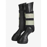 Black lemieux grafter boots with reflective beige and black stripes offer durable protection for horse legs