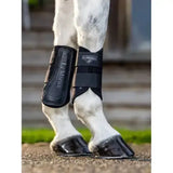 Black lemieux grafter brushing boot with padded straps and a sleek highly durable design for horse leg protection