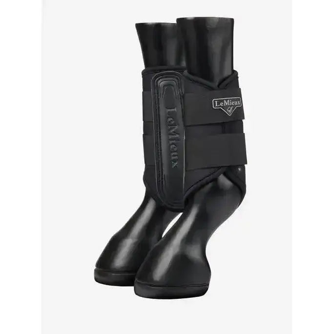 Black lemieux grafter brushing boot with a glossy finish and adjustable straps for highly durable leg protection