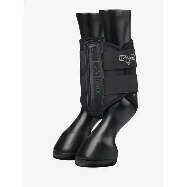 Black lemieux grafter brushing boot with a glossy finish and adjustable straps for highly durable leg protection