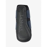Back side of lemieux grafter brushing boot navy with highly durable textured rubber sole for horse protection