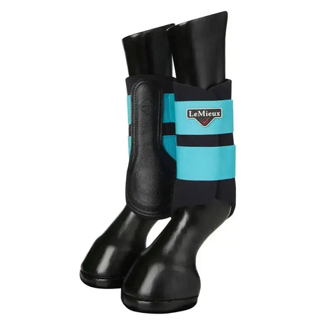 Black and turquoise lemieux grafter brushing boots azure with a glossy finish for horse leg protection