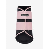 Pink and black lemieux grafter brushing boots blossom with contrasting trim for horse hoof protection