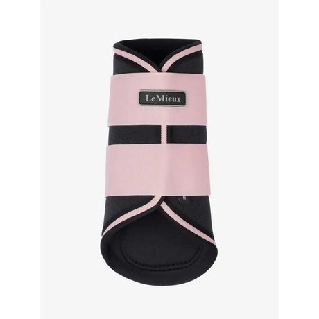 Pink and black lemieux grafter brushing boots blossom with contrasting trim for horse hoof protection