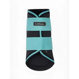 Teal and black lemieux grafter brushing boots lagoon with elastic straps for easy secure fit on horse hooves