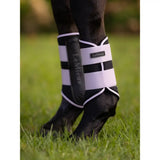 Black and white striped lemieux grafter brushing boots lilac horse ankle guard with sleek padded design