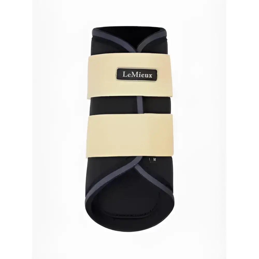 Black lemieux grafter brushing boots with cream straps and gray trim for ultimate leg protection