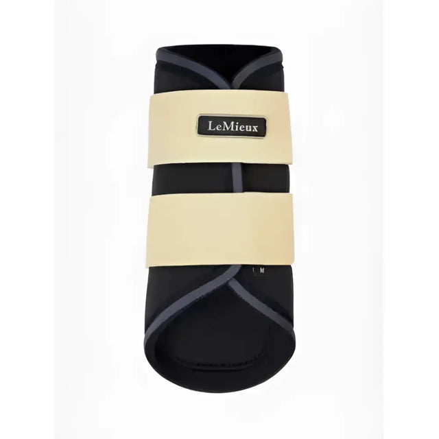 Black lemieux grafter brushing boots with cream straps and gray trim for ultimate leg protection