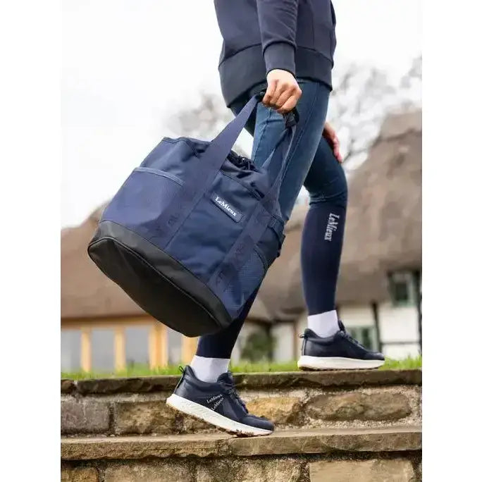Navy blue lemieux grooming tote with black reinforced bottom and handles perfect as an easy access grab-and-go bag