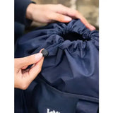 Navy blue lemieux grooming tote with black cord and button closure perfect easy access grab-and-go bag