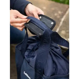 Navy blue fabric lemieux grooming tote with black strap and embossed branding perfect easy access grab-and-go bag