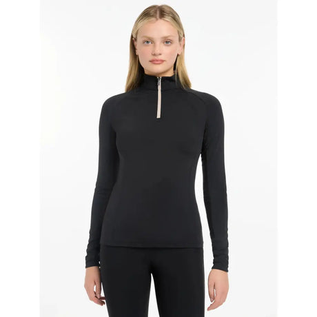 Black long-sleeved lemieux halle lightweight base layer top with silver zipper at high neck for active wear