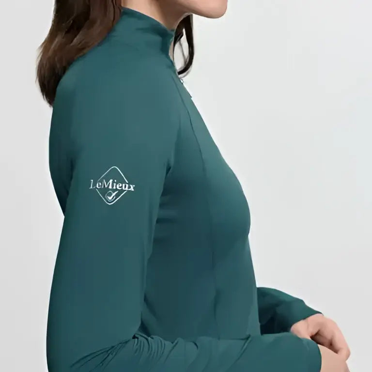 Teal lemieux halle lightweight base layer jungle long-sleeved zip-up top with white embroidered logo on left sleeve