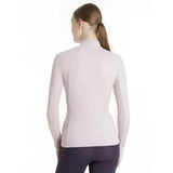 A lemieux halle lightweight lilac long-sleeved base layer with a seamless high neckline for athletic wear