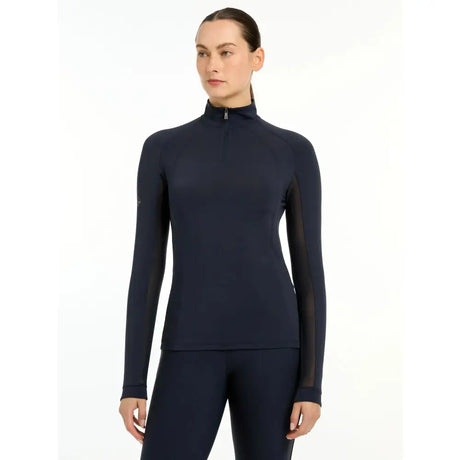 Navy blue lemieux halle lightweight long sleeve base layer with sheer mesh side panels for breathable comfort
