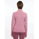 A soft pink lemieux halle lightweight base layer peony with long sleeves and smooth, form-fitting fabric
