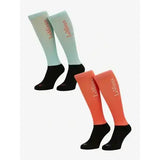 A pair of lemieux harlow competition socks dusty cora and blue topaz with black toe and heel and vertical branding