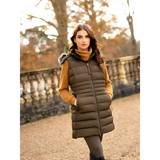 Woman in olive green harper longline puffer gilet over mustard sweater