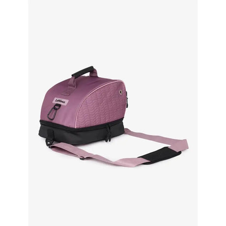 Purple quilted lemieux hat box mallow bike helmet bag with black accents and adjustable shoulder strap