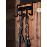 Black metal lemieux headcollar hanger holding a black leather lemieux headcollar headcollar hanger black