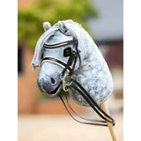 A gray dapple lemieux hobby horse head on a stick with black leather double bridle and silver hardware