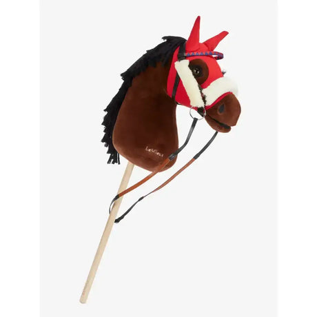 A plush lemieux hobby horse head in brown and red with a black mane white muzzle trim and a purple elastane hood chilli bridle