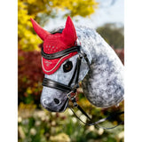 Red crocheted lemieux hobby horse fly hood chilli with black leather bridle and gold embroidery by lameaux