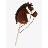 Brown plush lemieux hobby horse head with black fringed mane and white racing bridle on wooden stick for hobby horse racing