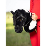 Black and white plush lemieux hobby horse backpack with faux leather bridle details hobby horse razzle design