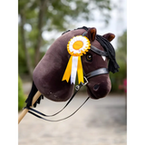 Plush toy horse head with yellow and white rosette ribbon from Lemieux Hobby Horse