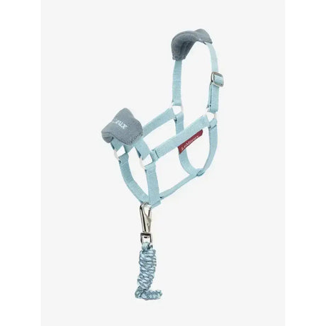 Light blue lemieux hobby horse vogue headcollar glacier with gray padded ears nose and matching braided lead rope attached