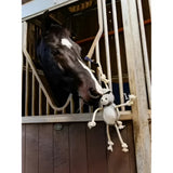 A gray rope-bodied toy donkey with a white face and black eyes in the lemieux horse toy collection