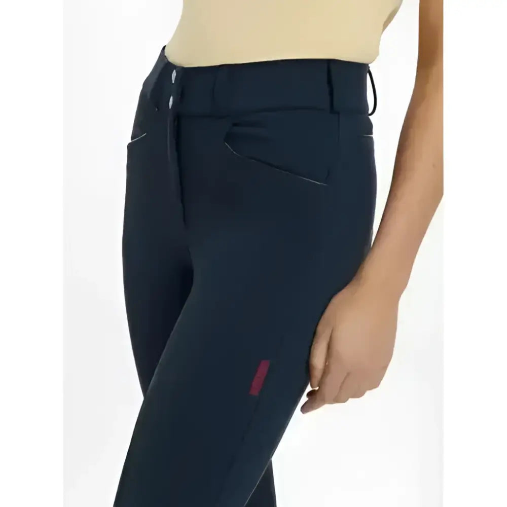 Black lemieux imogen knee grip breeches with sleek fit and subtle pink branding on thigh in navy color