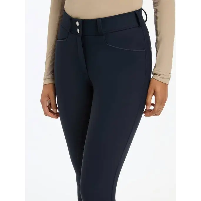 Navy blue fitted Lemieux Isabelle Full Seat Breeches for women’s equestrian wear