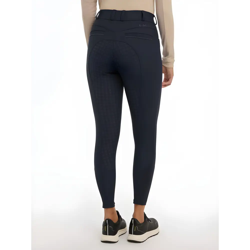 Person wearing Lemieux Isabelle Full Seat Breeches Navy in dark blue skinny style