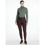 A sleek olive-green long-sleeved turtleneck top with quarter-zip collar perfect for lemieux isabelle knee grip breeches damson