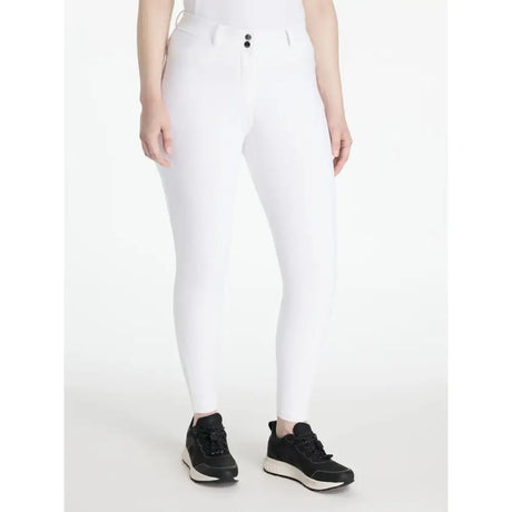 White lemieux isabelle knee grip breeches with sleek fit and black button closures at the waist