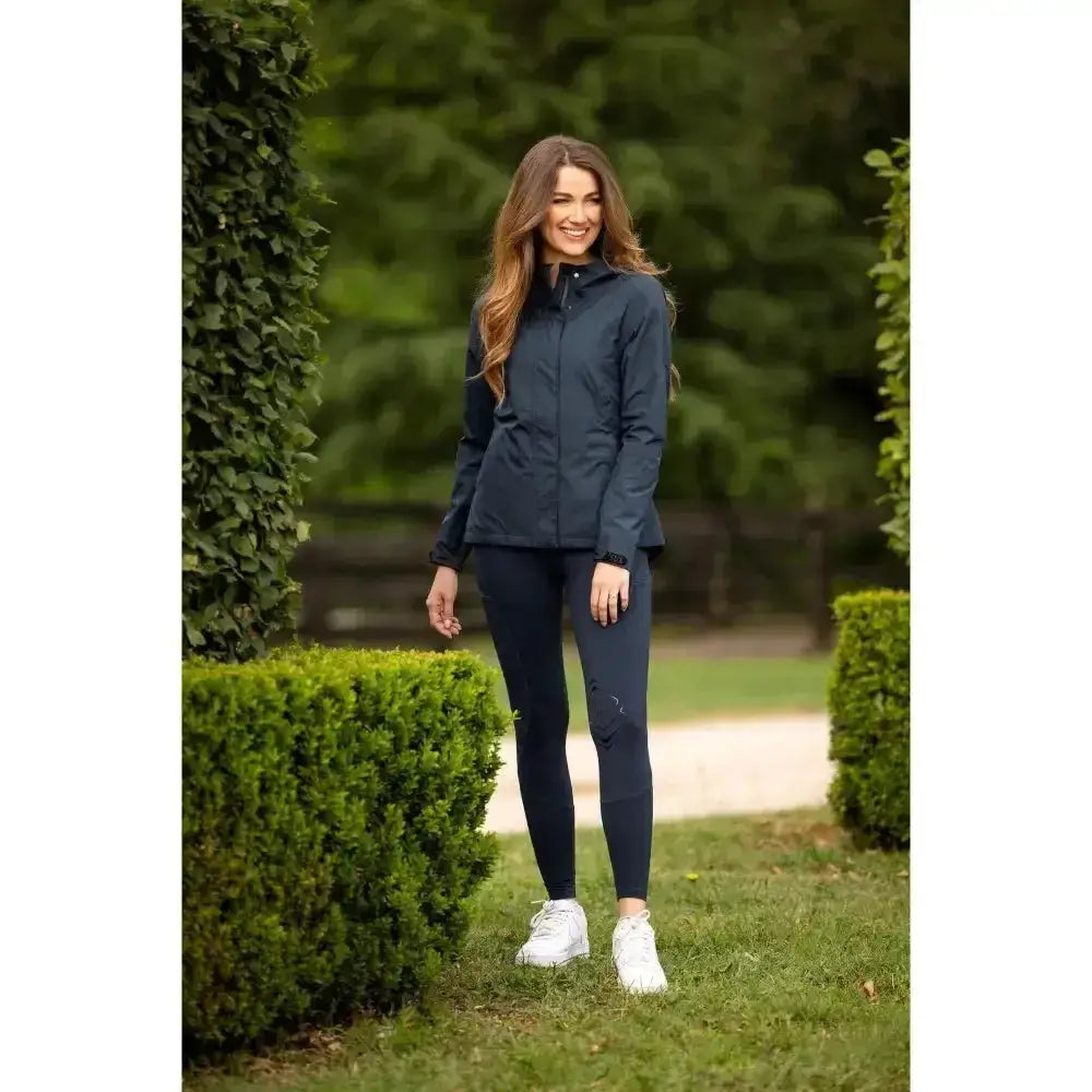 Navy blue lemieux isla short waterproof jacket with zippered pockets and high collar for riding use