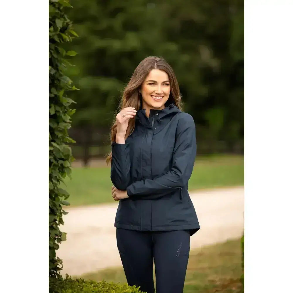 Navy blue lemieux isla short waterproof jacket with sleek modern design and subtle stitching details