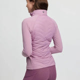 A soft lavender lemieux juliette jacket fondant with quilted body and soft jersey sleeves zip-up with high collar