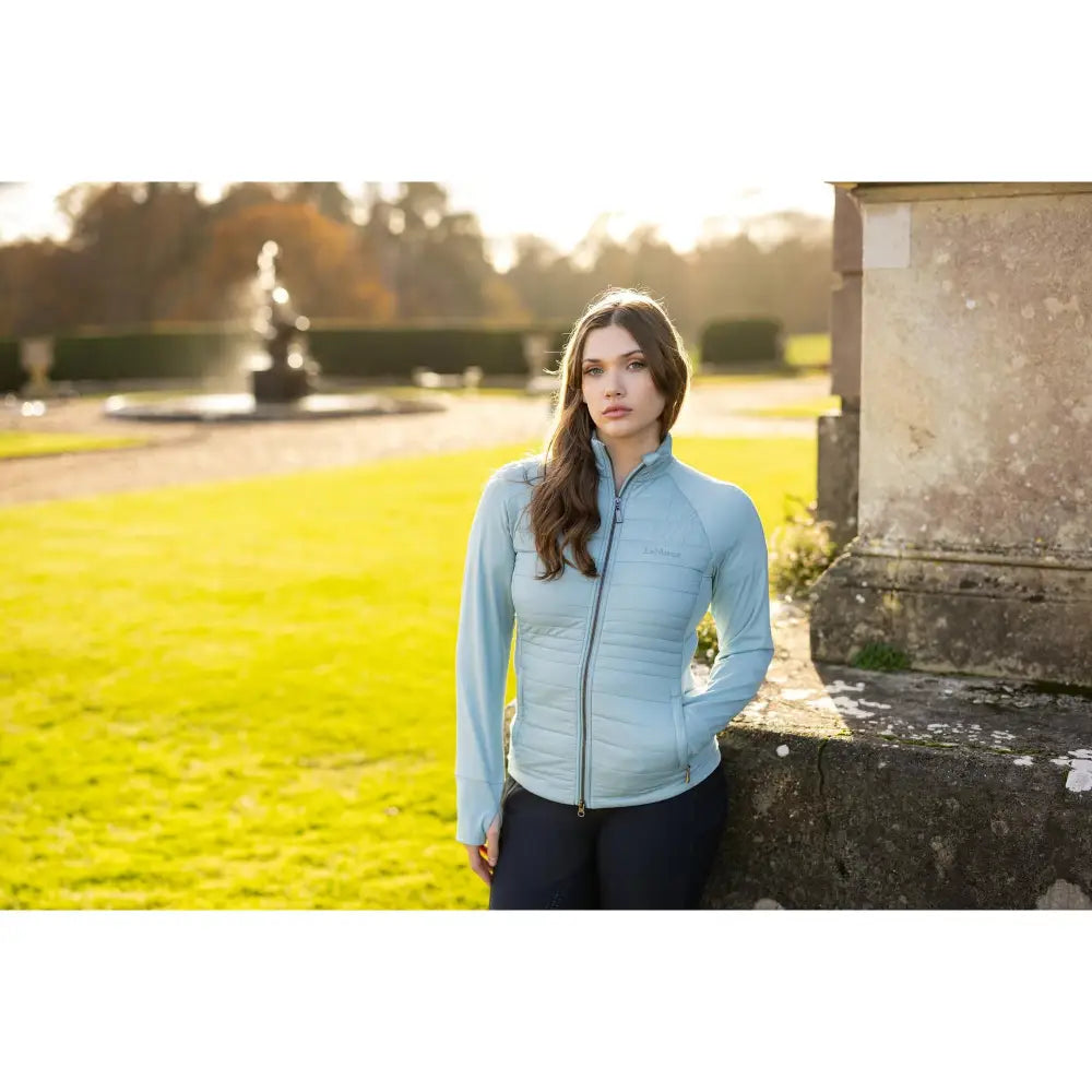 Light blue Lemieux Juliette Jacket Glacier worn by a woman with long brown hair