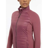A mauve quilted zip-up jacket with a high collar and long sleeves lemieux juliette jacket rosewood